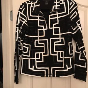 Long sleeve black and white jacket.